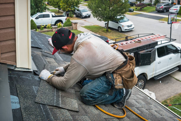 Professional Roofing technician working in East Helena, MT